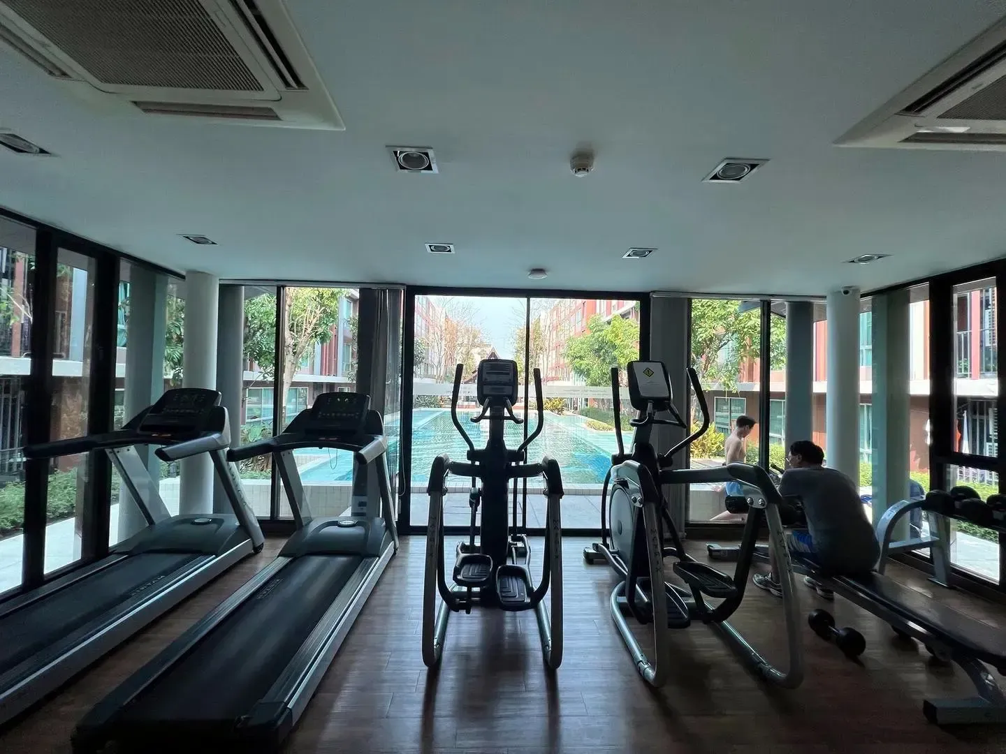 Modern air-conditioned fitness center overlooking the grounds